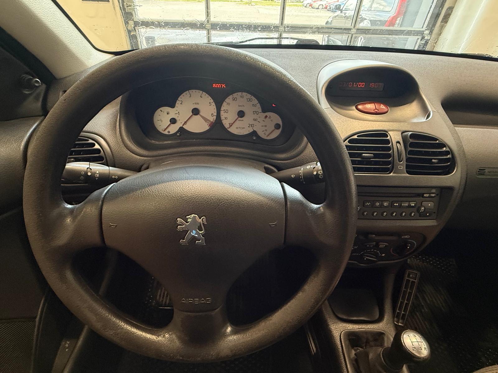 
								Peugeot 206 1,4 SE SW full									